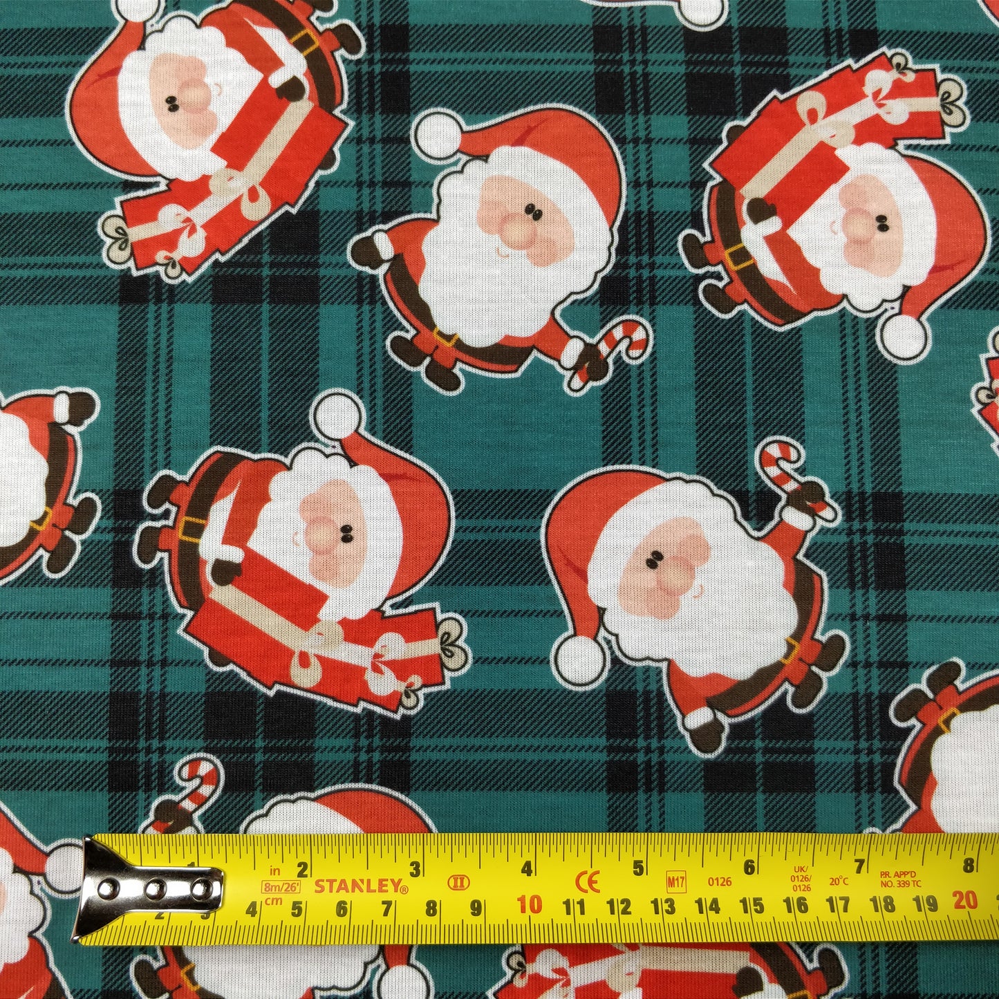 FS079_2 Christmas Tartan Santa Spun Polyester Jersey Knit Stretch Fabric Green | Fabric | Christmas, fabric, Green, jersey, polyester, presents, santa, Santa Clause, snowflakes, Soft, spun polyester, Spun Polyester Elastane, Tartan, Teal, xmas | Fabric Styles