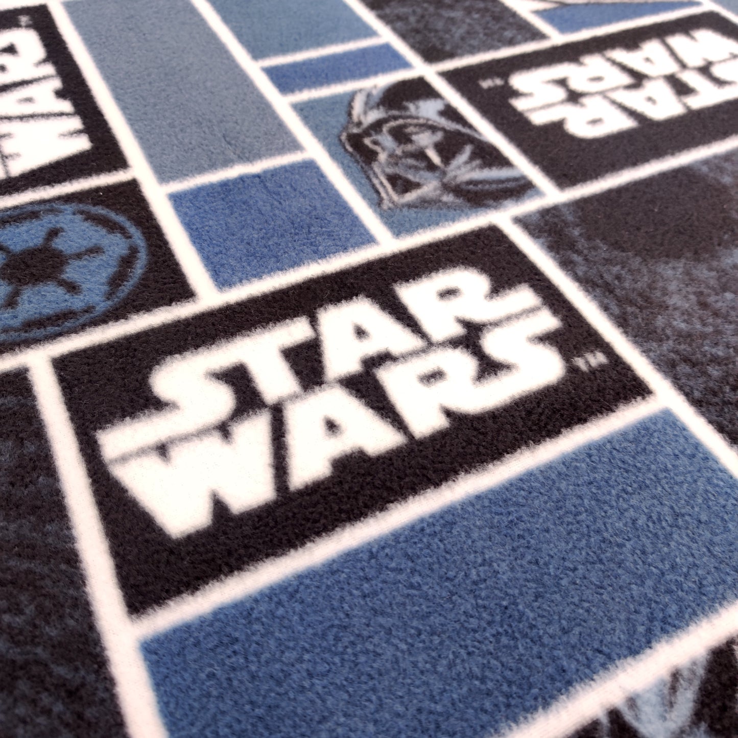 FS598_1 Darth Vader Star Wars Fleece Fabric Blue | Fabric | blue, Brand, Branded, Classic, Classics, Denim, drape, Fabric, fashion fabric, jersey, Light blue, making, Poly Fleece, Robot, sewing, Skirt, Star Wars, Stretchy, Watercolour | Fabric Styles