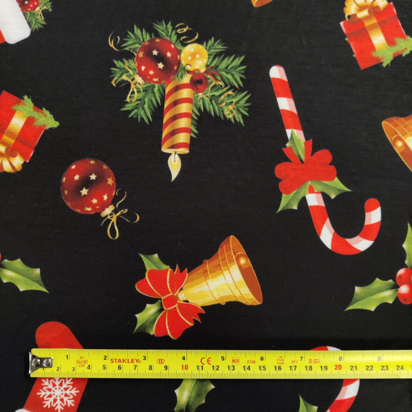 FS696 Candy Stick Spun Polyester Jersey Knit Stretch Fabric Black | Fabric | bauble, Baubles, Black, Candy Cane, Candy Stick, Christmas, christmas tree, Fabric, Gingerbread, Gold, Sale, Santa, Spun Polyester, Spun Polyester Elastane, Star, xmas | Fabric Styles