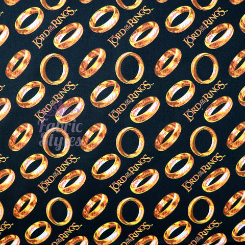 FS982_5 Lord The Of The Rings Tossed Black - Cotton | Fabric | Book, Brand, Branded, Characters, Children, comics, Cotton, Fabric, fashion fabric, Logo, Lord, Lord of the Rings, making, Movie, Ring, Rings | Fabric Styles