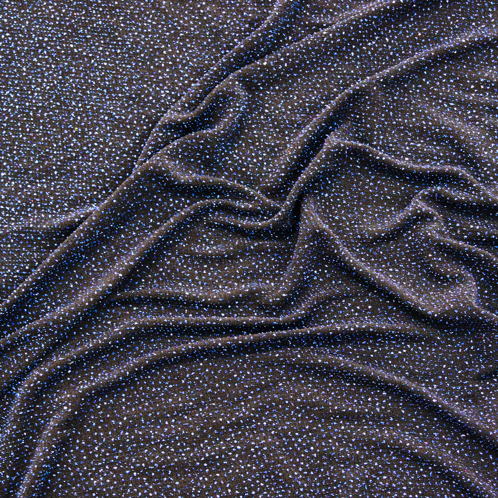 Close-up of black glittery fabric texture