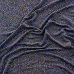 Close-up of black glittery fabric texture