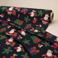 Dancing Santa Fabric | Novelty Santa Print on Black