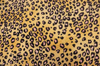 Golden Leopard Fleece Fabric Pink Black Spots with Stretch