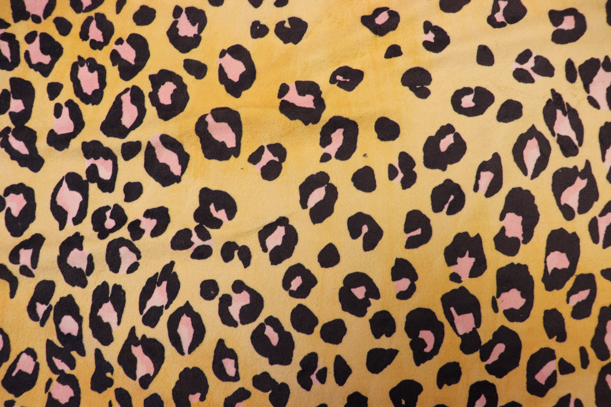 Golden Leopard Fleece Fabric Pink Black Spots with Stretch