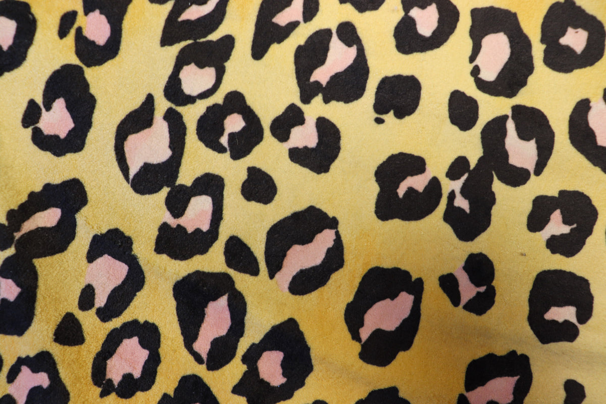 Golden Leopard Fleece Fabric Pink Black Spots with Stretch