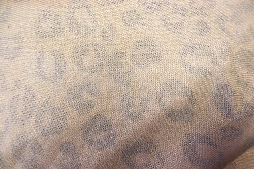Golden Leopard Fleece Fabric Pink Black Spots with Stretch