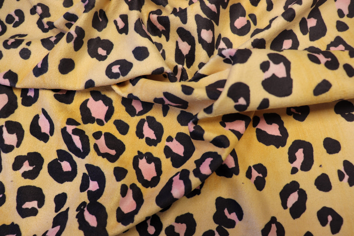 Golden Leopard Fleece Fabric Pink Black Spots with Stretch