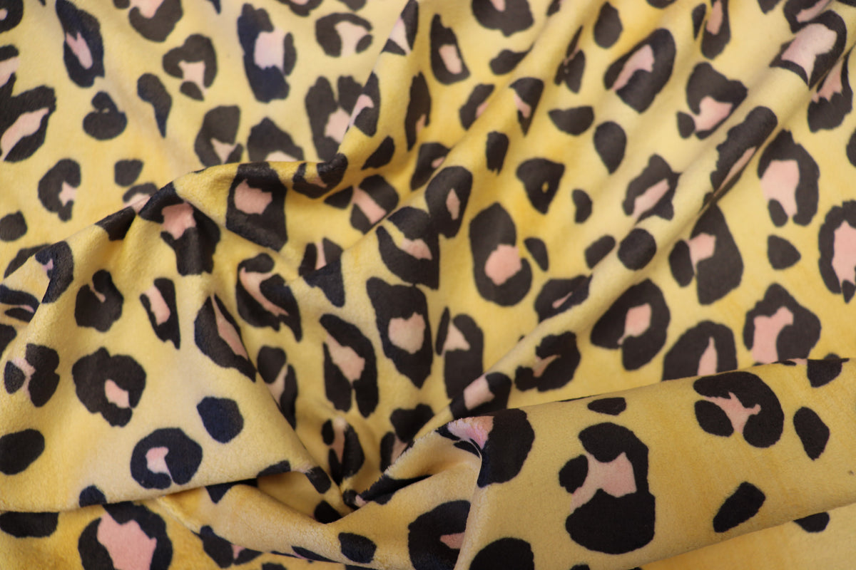Golden Leopard Fleece Fabric Pink Black Spots with Stretch