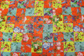 Floral Tile Knitwear Fabric Orange Teal Yellow Stretch