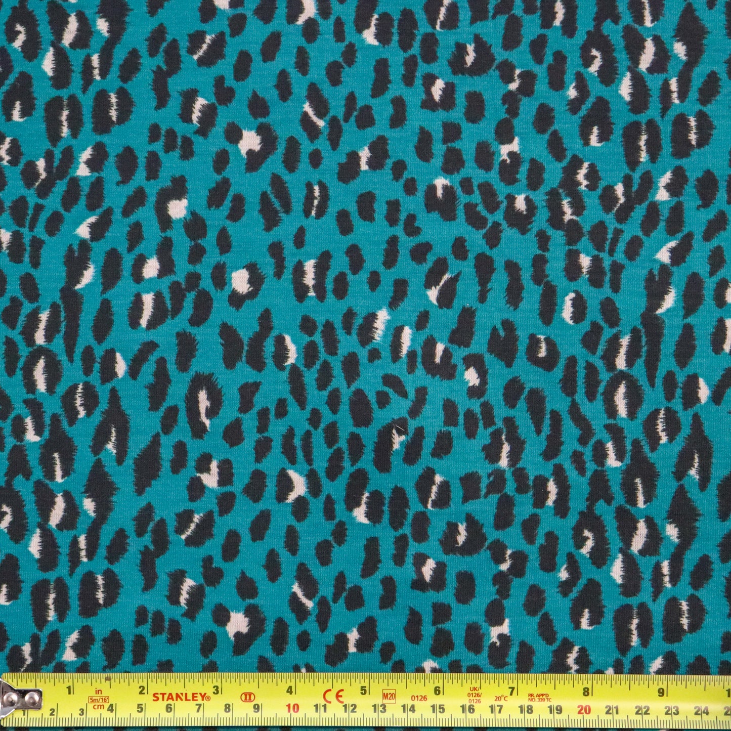 Teal Leopard Spun Polyester Fabric