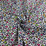 FS1024 Funky Leopard Cotton Fabric Rainbow | Fabric | animal, children, Cotton, drape, Fabric, fashion fabric, Fur, Kids, Leopard, Lightning, making, Rainbow, sewing, Skirt | Fabric Styles