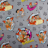 FS802 The Flintstones Cotton Fabric Grey | Fabric | Blue, Brand, Branded, Children, Cotton, drape, Fabric, fashion fabric, Flinstone, Flinstones, Grey, Grey Base, hero, Kids, logo, sewing | Fabric Styles