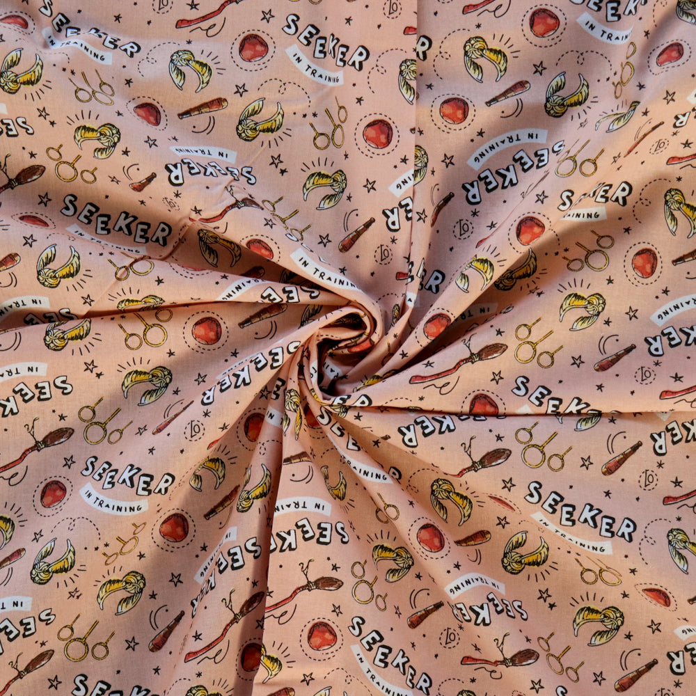 FS635_27 Harry Potter – Seeker in Training Coral Cotton Fabric | Fabric | Broomstick, Children, Cotton, Fabric, FS635, Harry Potter, Hogwarts, licensed, New, Seeker, Training, witch | Fabric Styles