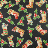 FS078 Christmas Print, Stockings Holly | Fabric | Black, candy, Christmas, fabric, Holly, jersey, polyester, presents, Sale, spun polyester, Spun Polyester Elastane, Stocking, stockings, Sweets, xmas | Fabric Styles