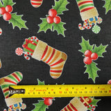 FS078 Christmas Print, Stockings Holly | Fabric | Black, candy, Christmas, fabric, Holly, jersey, polyester, presents, Sale, spun polyester, Spun Polyester Elastane, Stocking, stockings, Sweets, xmas | Fabric Styles