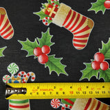 FS078 Christmas Print, Stockings Holly | Fabric | Black, candy, Christmas, fabric, Holly, jersey, polyester, presents, Sale, spun polyester, Spun Polyester Elastane, Stocking, stockings, Sweets, xmas | Fabric Styles