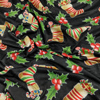 FS078 Christmas Print, Stockings Holly | Fabric | Black, candy, Christmas, fabric, Holly, jersey, polyester, presents, Sale, spun polyester, Spun Polyester Elastane, Stocking, stockings, Sweets, xmas | Fabric Styles