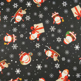 FS074 Christmas Print, Santa, Snowflakes, Sledge, Presents Spun Polyester Knit Stretch Fabric Black | Fabric | Christmas, fabric, jersey, polyester, Present, presents, rudolf, santa, Santa Clause, sledge, Snow, Snowflake, snowflakes, spun polyester, Spun Polyester Elastane, xmas | Fabric Styles