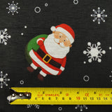 FS074 Christmas Print, Santa, Snowflakes, Sledge, Presents Spun Polyester Knit Stretch Fabric Black | Fabric | Christmas, fabric, jersey, polyester, Present, presents, rudolf, santa, Santa Clause, sledge, Snow, Snowflake, snowflakes, spun polyester, Spun Polyester Elastane, xmas | Fabric Styles