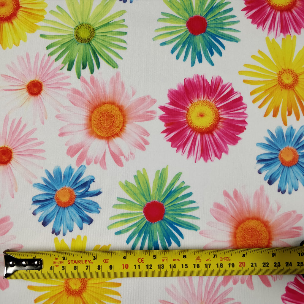 FS207_1 Multi Colour Gerbra Daisy | Fabric | Black, Blue, Daisies, Daisy, drape, Dress Fabric, Dress making, Dressmaking Fabric, Fabric, fabricstyles, fashion fabric, Floral, Flower, Green, Light Pink, making, Orange, Pink, Purple, Scuba, sewing, sunflower, White, Yellow | Fabric Styles