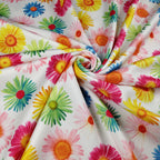 FS207_1 Multi Colour Gerbra Daisy | Fabric | Black, Blue, Daisies, Daisy, drape, Dress Fabric, Dress making, Dressmaking Fabric, Fabric, fabricstyles, fashion fabric, Floral, Flower, Green, Light Pink, making, Orange, Pink, Purple, Scuba, sewing, sunflower, White, Yellow | Fabric Styles