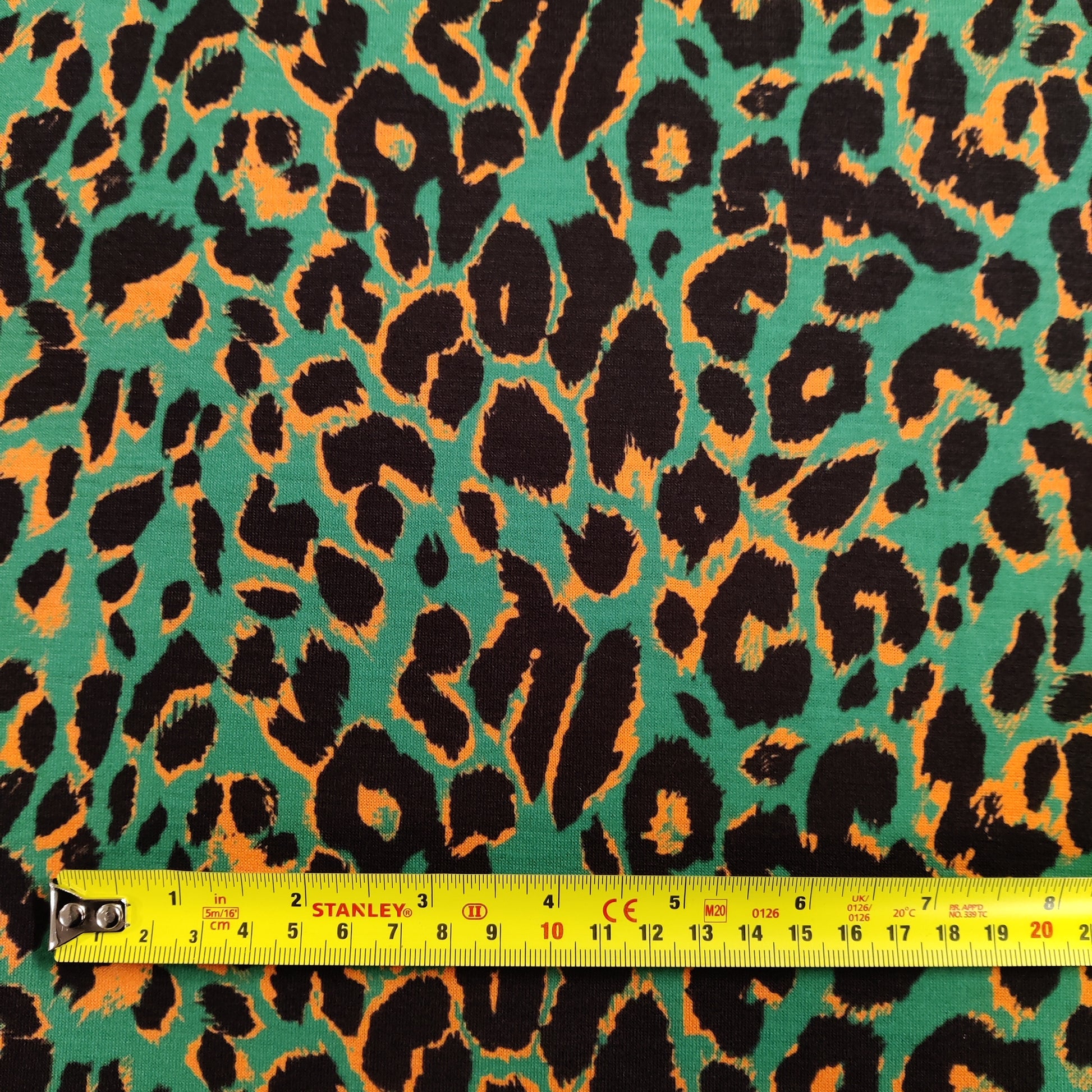 FS872_1 Green & Grey Leopard | Fabric | Animal, Animals, drape, Fabric, fashion fabric, Green, Grey, Leopard, Leopards, Sale, sewing, spun poly, Spun Polyester, Spun Polyester Elastane, Stretchy | Fabric Styles