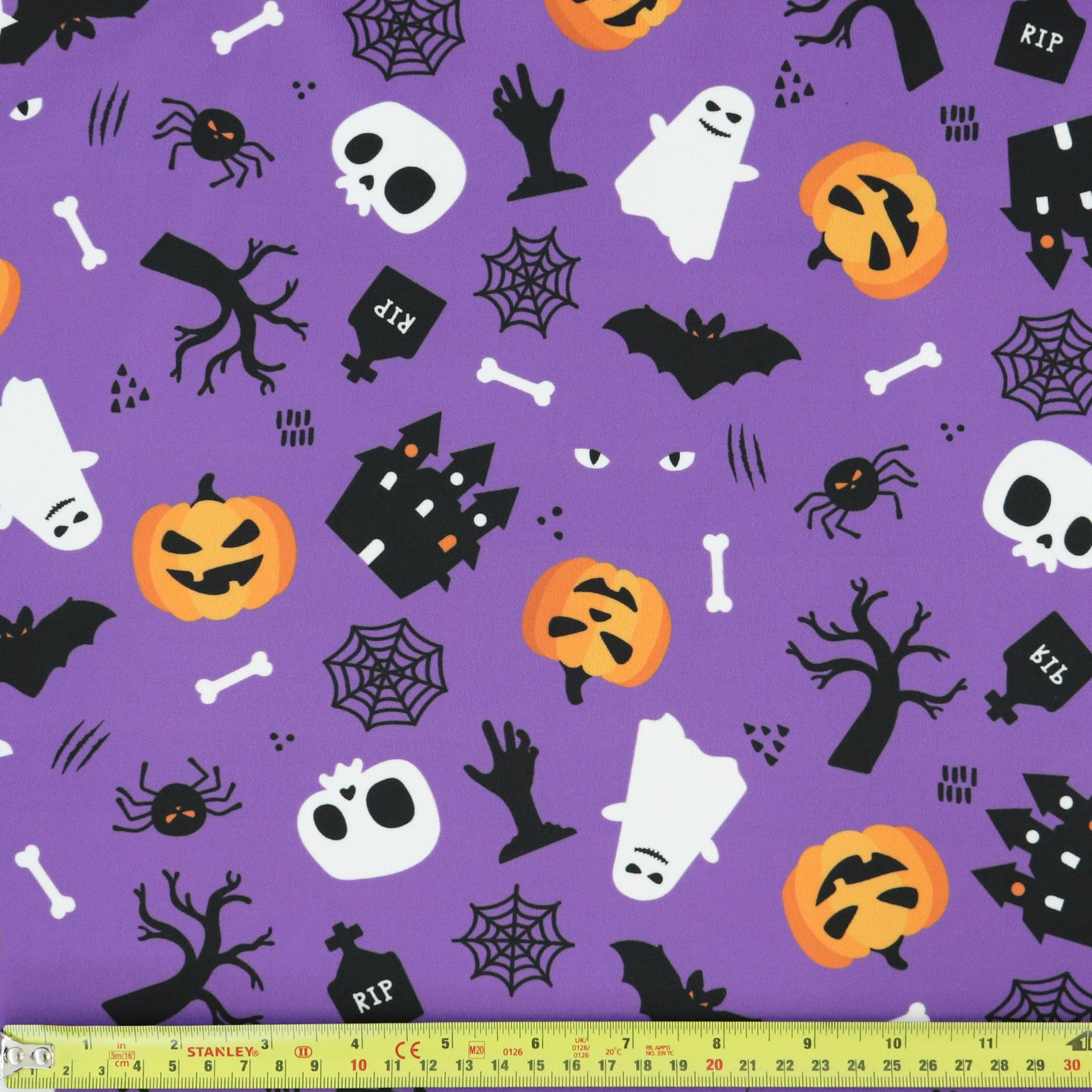 FS1125 Spooky Cemetry Purple Scuba Jersey Stretch | Fabric | Bones, Ghost, halloween, pumpkin, Purple, scuba, spider, Spooky, Webs | Fabric Styles