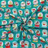 FS1162 Christmas Santa Snowglobes Cotton Fabric Green | Fabric | 100% Cotton, Christmas, Cotton, drape, Fabric, face, fashion fabric, Hat, making, Reindeer, sewing, Sledge, sleigh, Snake, Snow, Snowflake, snowflakes, Snowing, Snowman, Snowmen, Stars, xmas | Fabric Styles